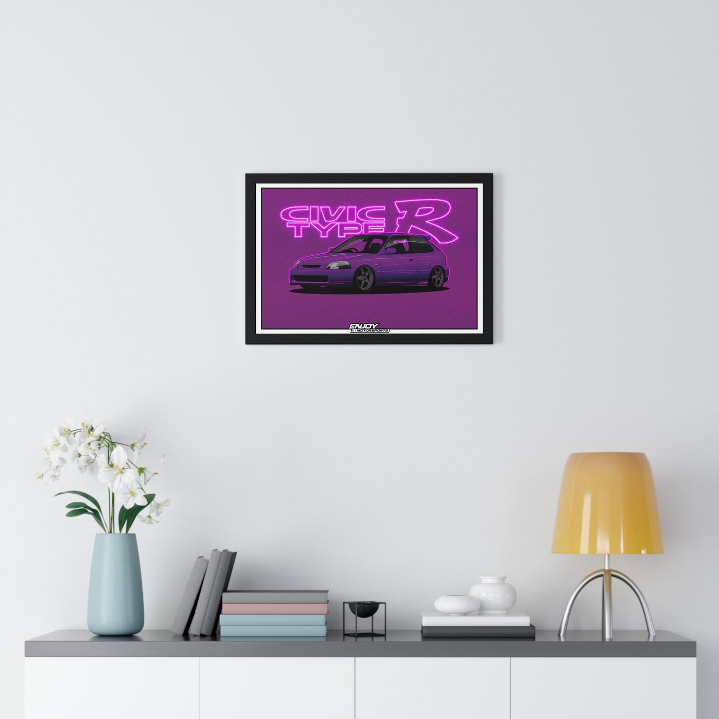 Framed art print of the EK9 Civic Type R. The design features the outline of a type r emblem with neon lighting and a Japanese cherry blossom (Sakura) patterned background, giving a modern and vibrant vibe.